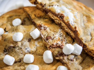 Monster S’mores Cookie topped with marshmallows and filled with melted chocolate